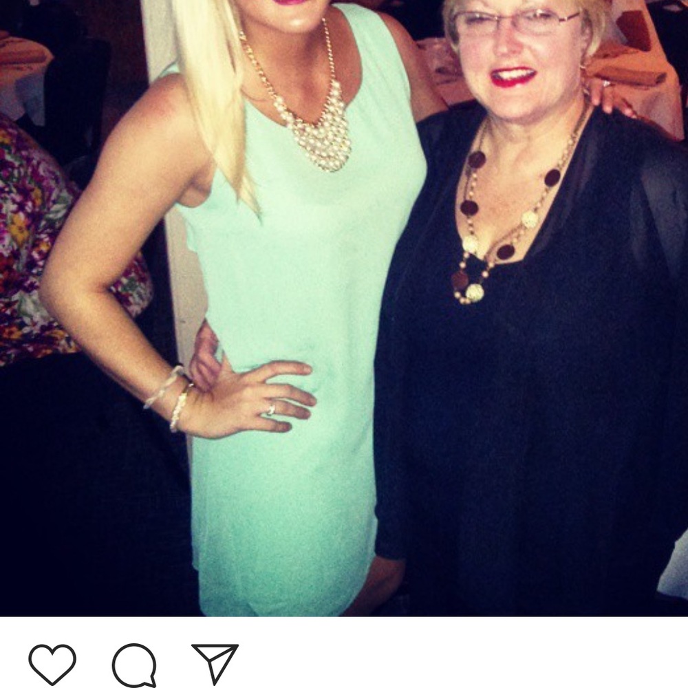 Teal dress with bow in the back